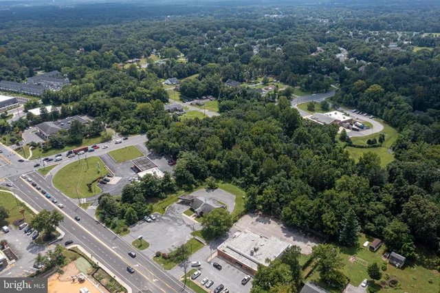 an aerial view of residential house with outdoor space