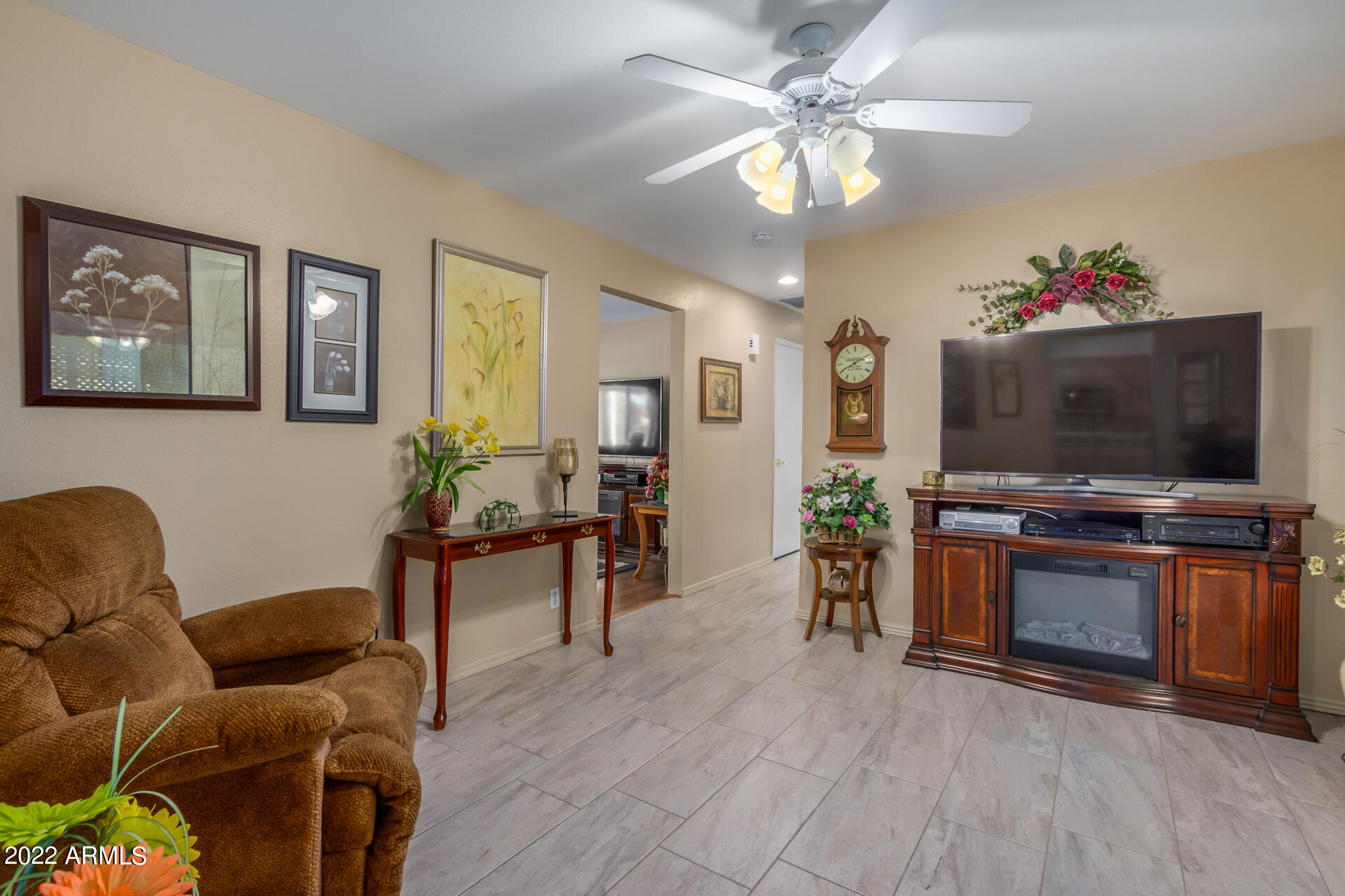 5853 East Adobe Road Mesa, AZ 85205 - Photo 12 of 26 a living room with furniture and a flat screen tv