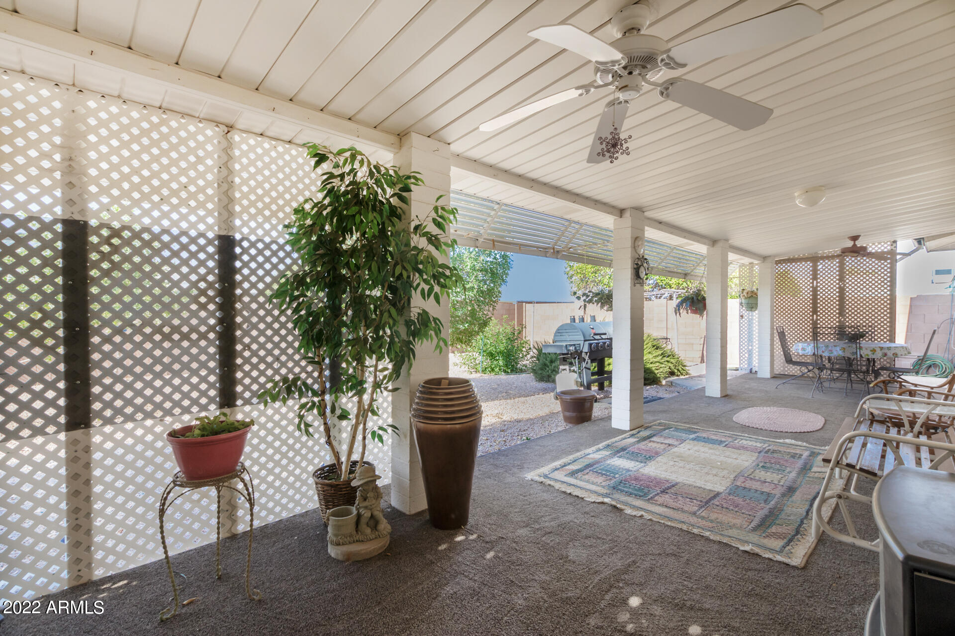 5853 East Adobe Road Mesa, AZ 85205 - Photo 23 of 26 a view of a dining room with furniture window and outside view