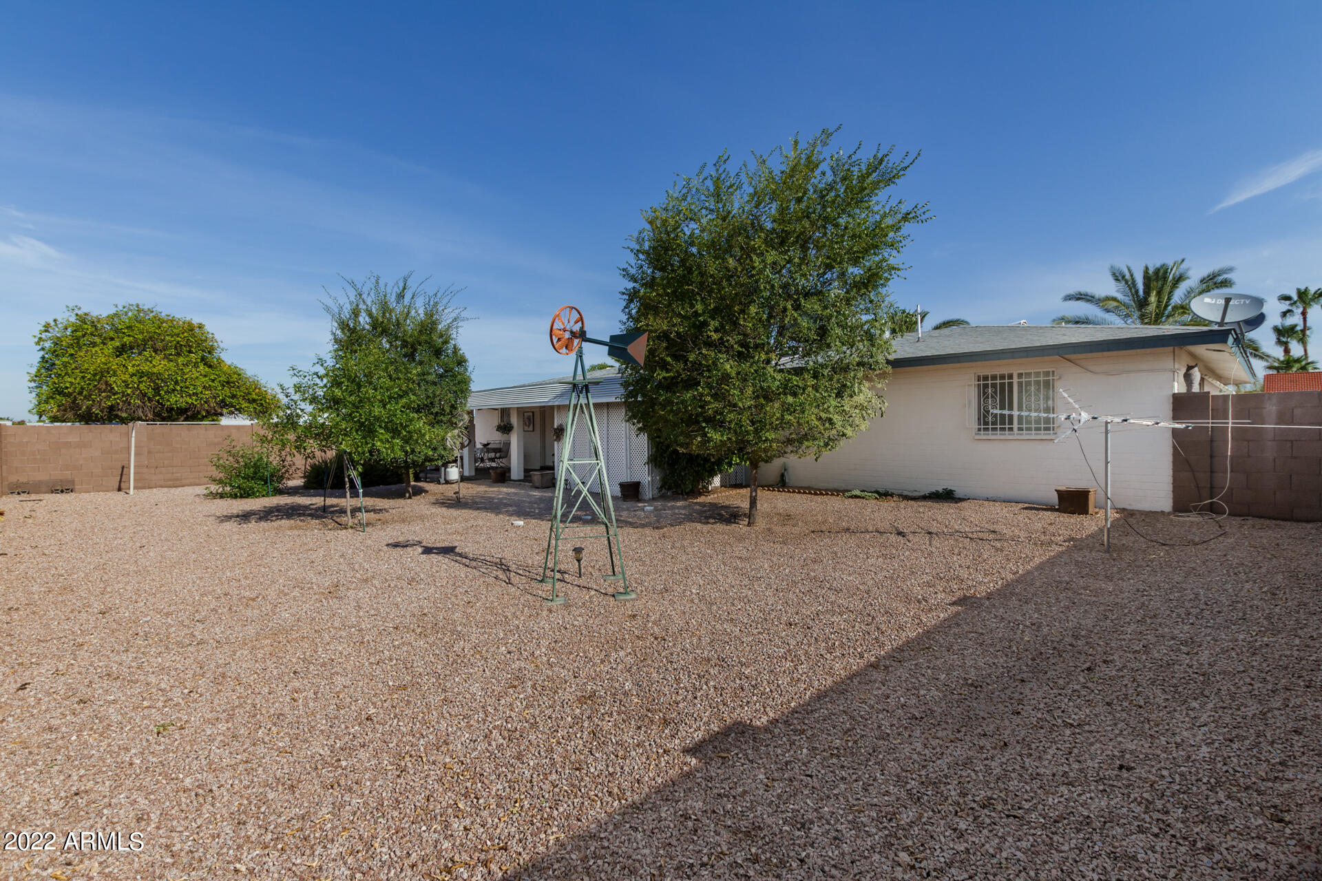 5853 East Adobe Road Mesa, AZ 85205 - Photo 25 of 26 a house with a tree in front of it