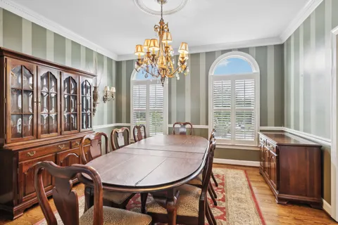 a living room with furniture fireplace and a flat screen tv