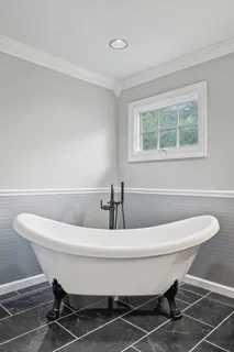 a white refrigerator freezer sitting inside of a kitchen