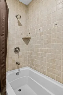 a view of a patio with a table chairs and a porch