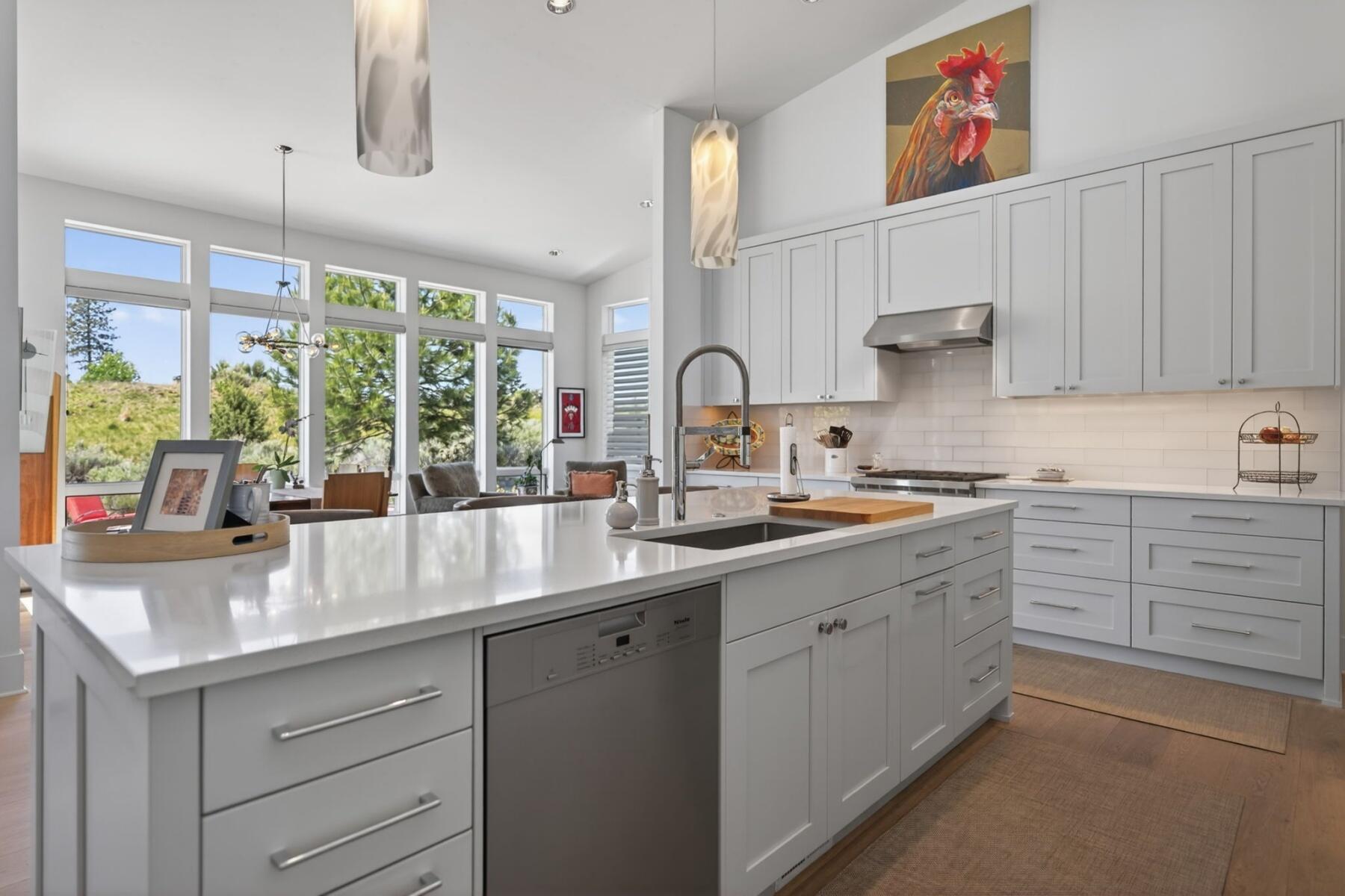 61487 Hackleman Court Bend, OR 97702 - Photo 12 of 35 a kitchen with sink cabinets and window