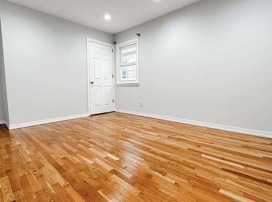 14 Centre Lane, Unit 2 Bayonne, NJ 07002 - Photo 12 of 21 a view of empty room with wooden floor