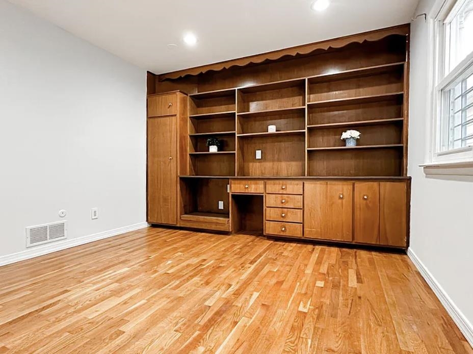 14 Centre Lane, Unit 2 Bayonne, NJ 07002 - Photo 14 of 21 a view of empty room with wooden floor and cabinet