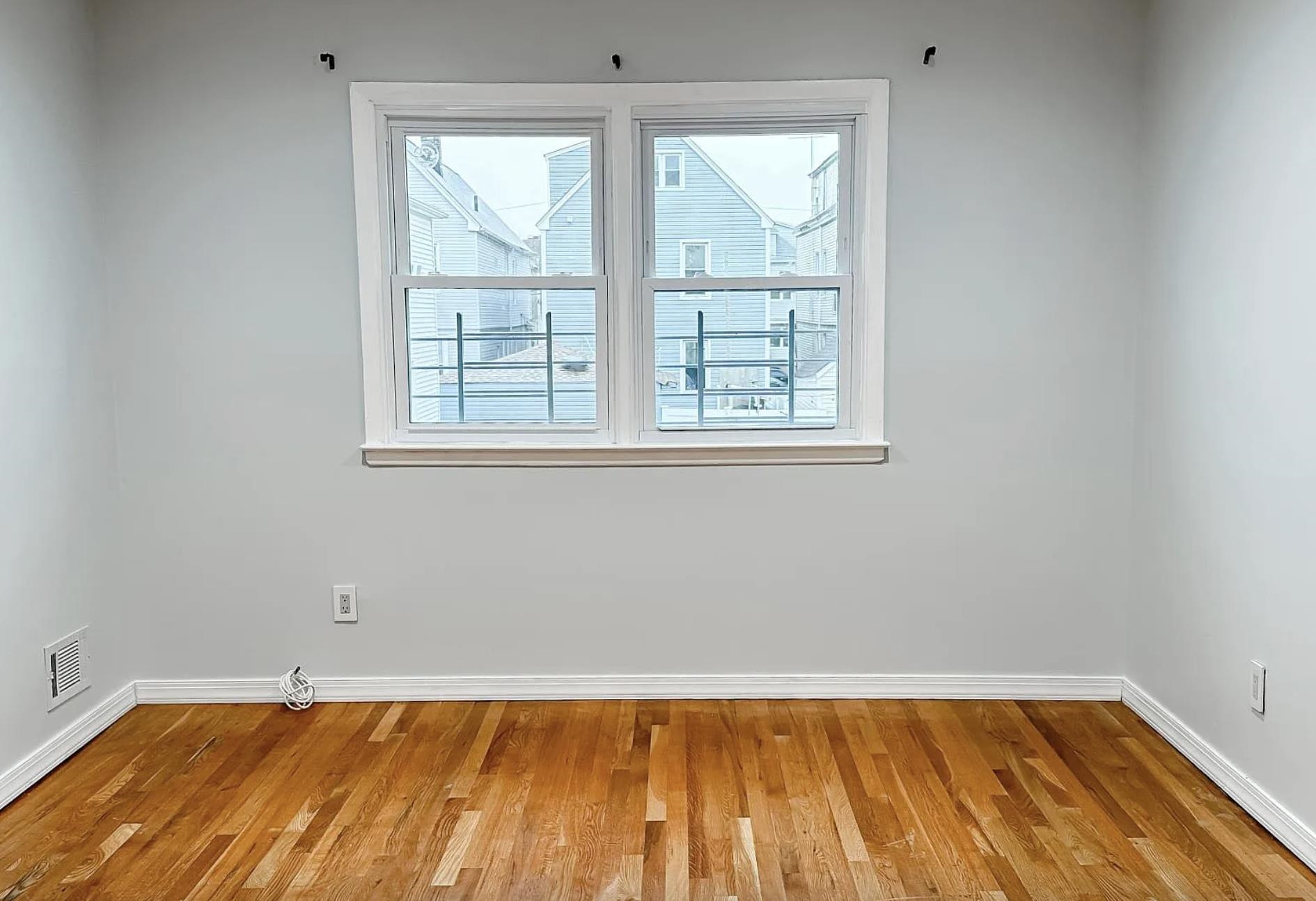 14 Centre Lane, Unit 2 Bayonne, NJ 07002 - Photo 17 of 21 an empty room with a window