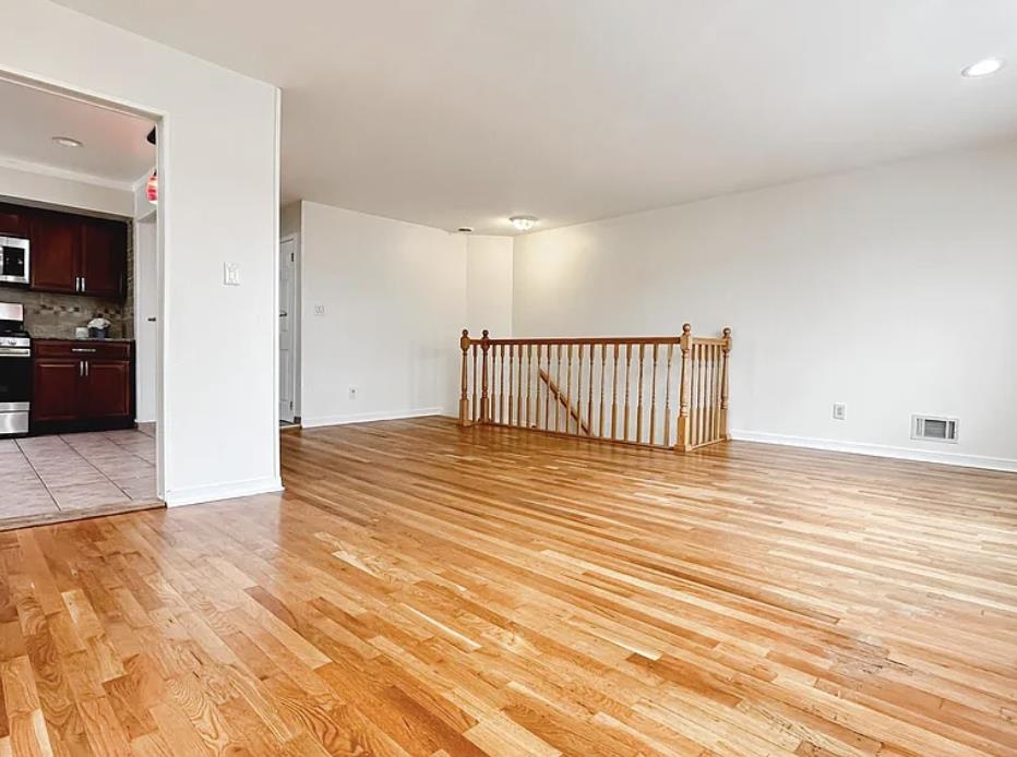 14 Centre Lane, Unit 2 Bayonne, NJ 07002 - Photo 4 of 21 a view of a room with wooden floor