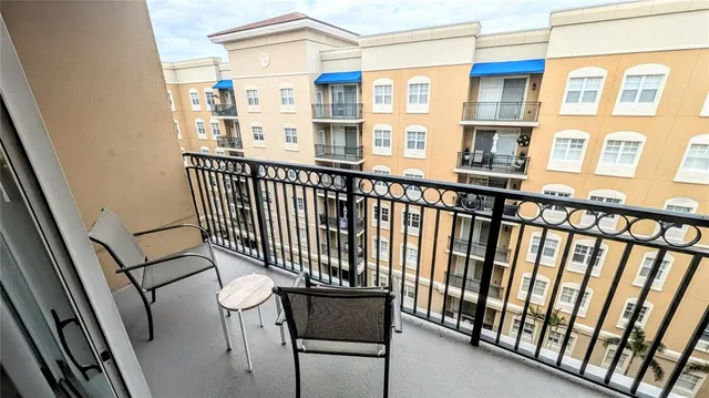 a bedroom with bed and a window
