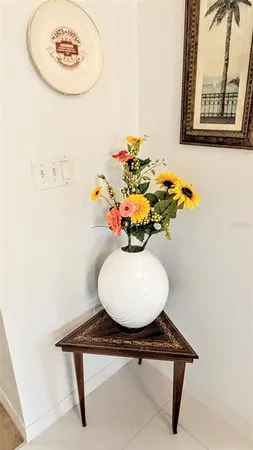 a vase of flowers sitting on a table