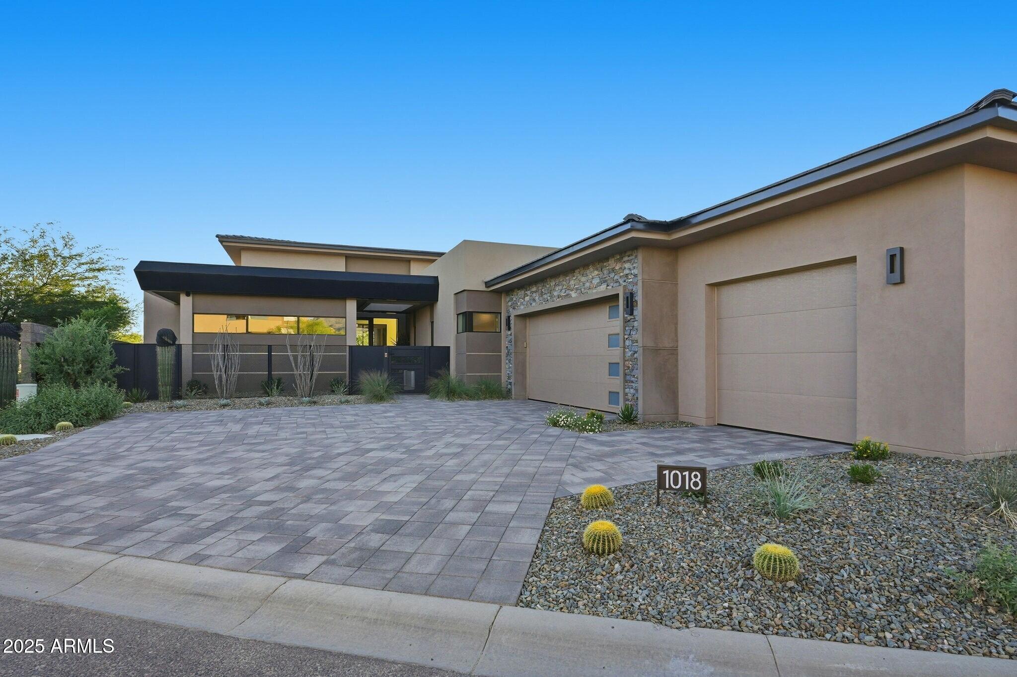 37200 North Cave Creek Road, Unit 1018 Scottsdale, AZ 85262 - Photo 2 of 54 002_Exterior Front Garage