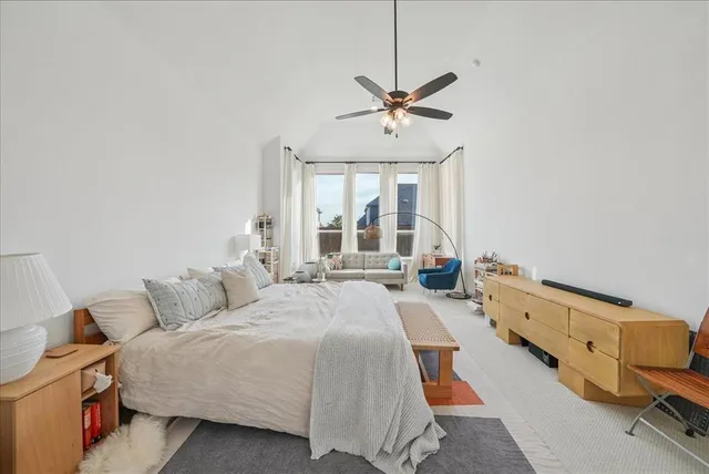 a bed room with a bed and a couch