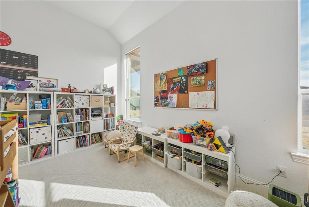 1981 Star Trace Parkway Prosper, TX 75078 - Photo 20 of 32 a view of a workspace with furniture and toys
