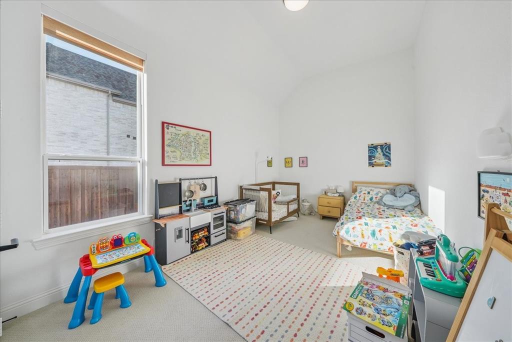 1981 Star Trace Parkway Prosper, TX 75078 - Photo 22 of 32 a children room with furniture and a couch