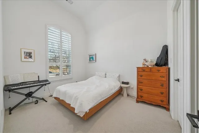 a bathroom with a toilet sink a shower and