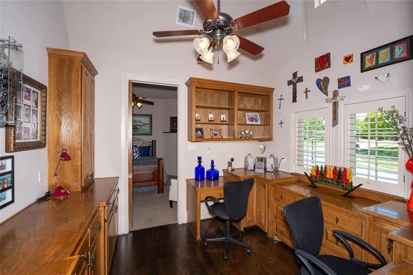 a living room with furniture pool table and flat screen tv