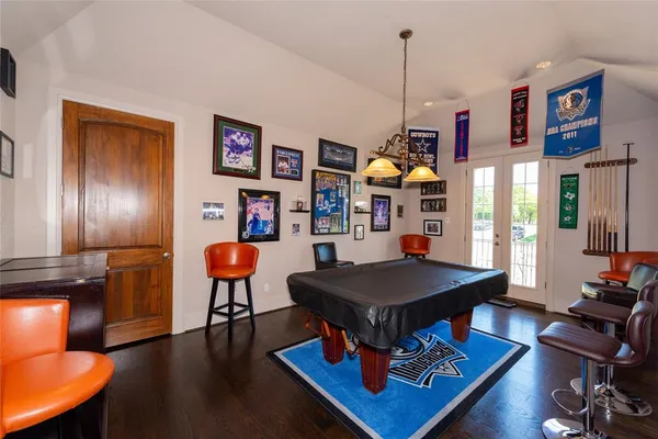 a room with furniture and a flat screen tv