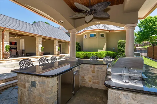 a outdoor space with patio furniture and potted plants