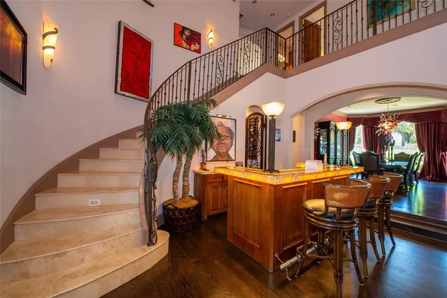 a room with dining table and chairs