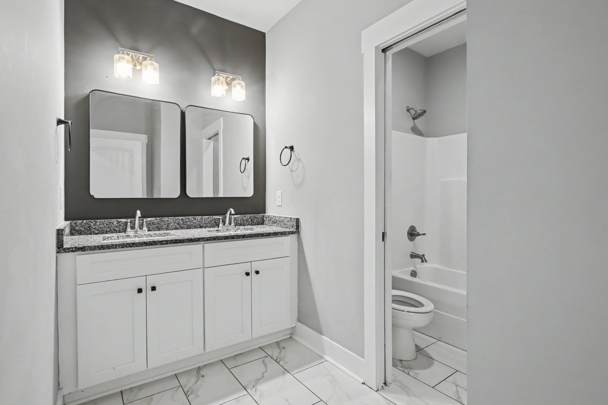 7208 Winding Way Pleasant View, TN 37146 - Photo 13 of 30 a bathroom with a granite countertop sink and a mirror