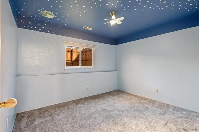 a view of a room that has a window in it