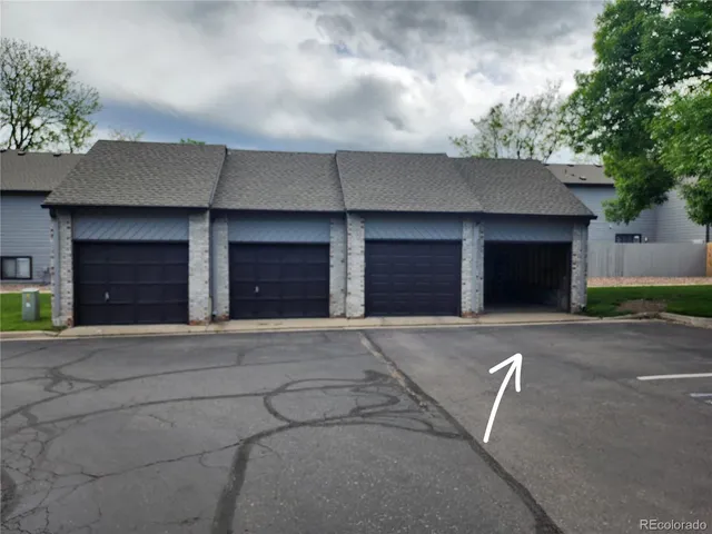 a view of a backyard with a garden