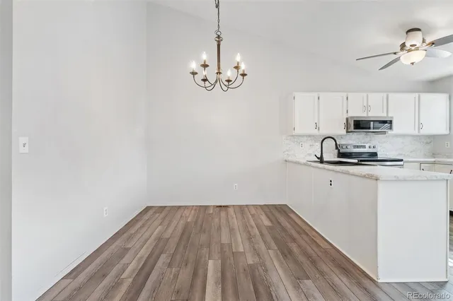 a view of kitchen and sink
