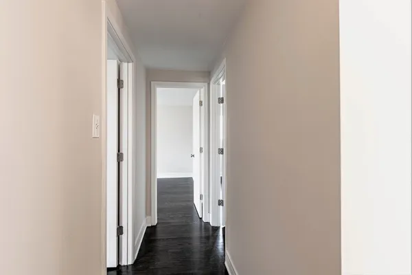 a view of a bathroom from the hallway