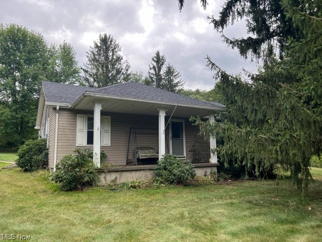 2360 Sheperds Valley Road New Cumberland, WV 26047 - Photo 13 of 16 View of front facade with a front yard and a porch