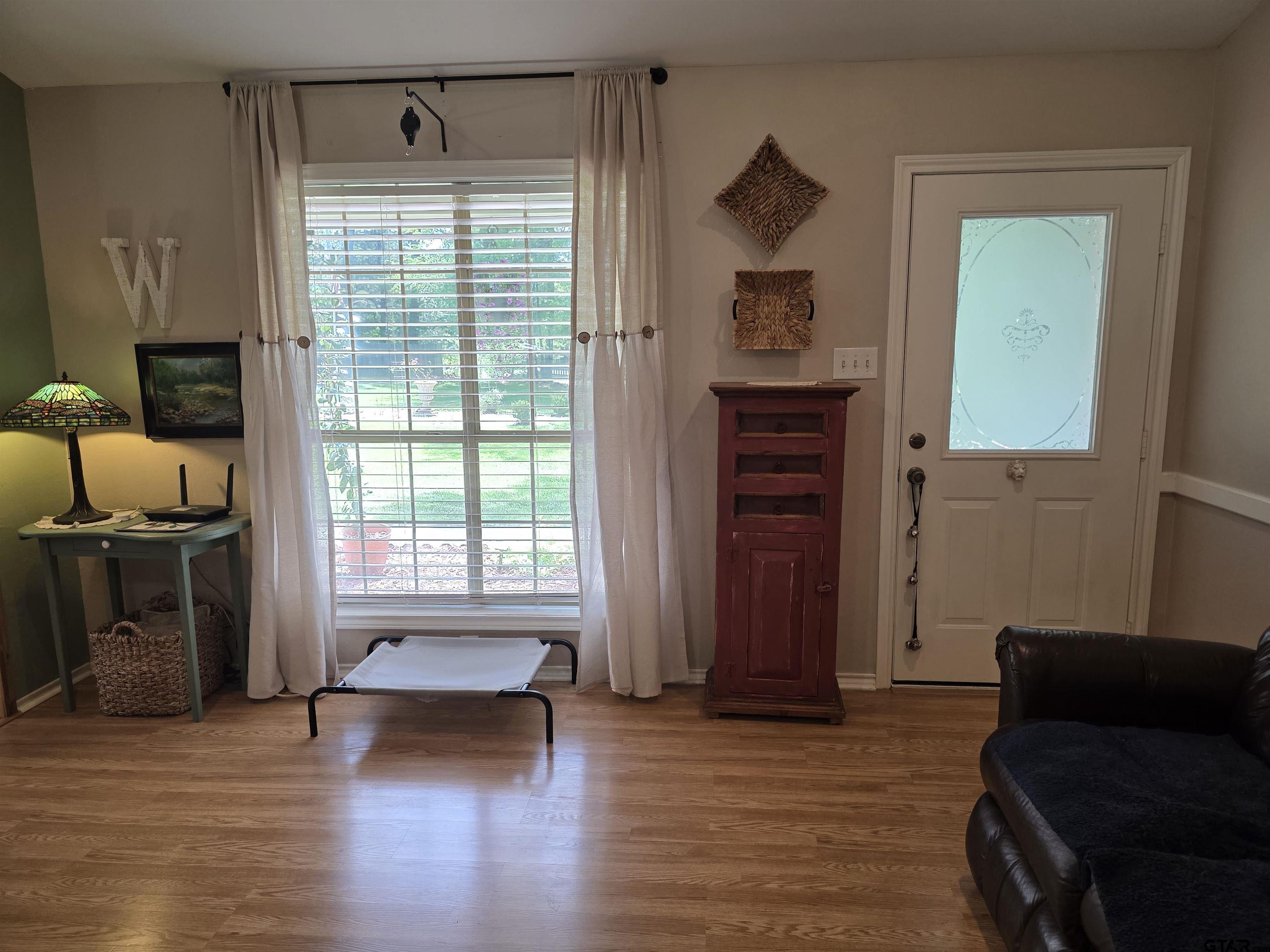 6170 Highway 271 Mount Pleasant, TX 75455 - Photo 13 of 43 a living room with furniture and a window