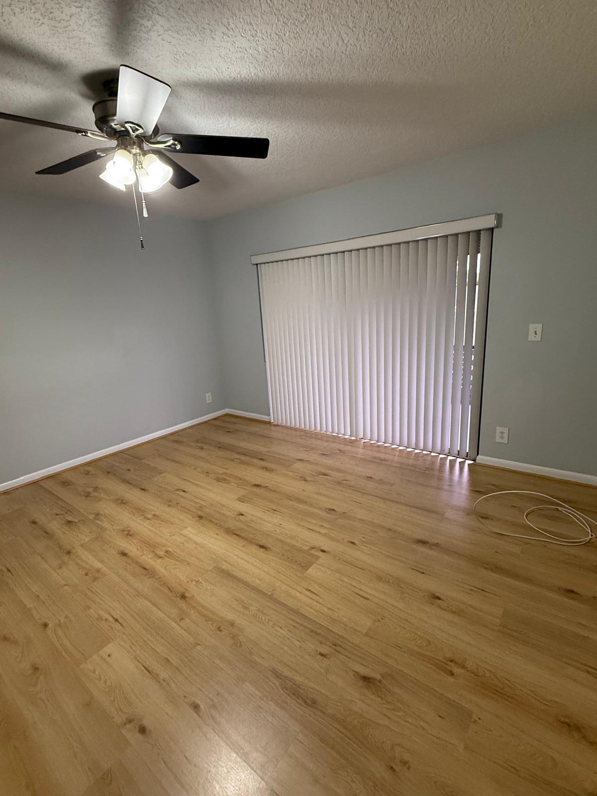 2335 Southwest 22nd Avenue, Unit 1030 Delray Beach, FL 33445 - Photo 41 of 41 a view of an empty room with wooden floor