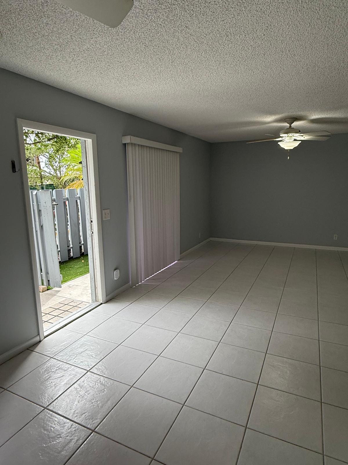 2335 Southwest 22nd Avenue, Unit 1030 Delray Beach, FL 33445 - Photo 10 of 41 a view of an empty room with a window