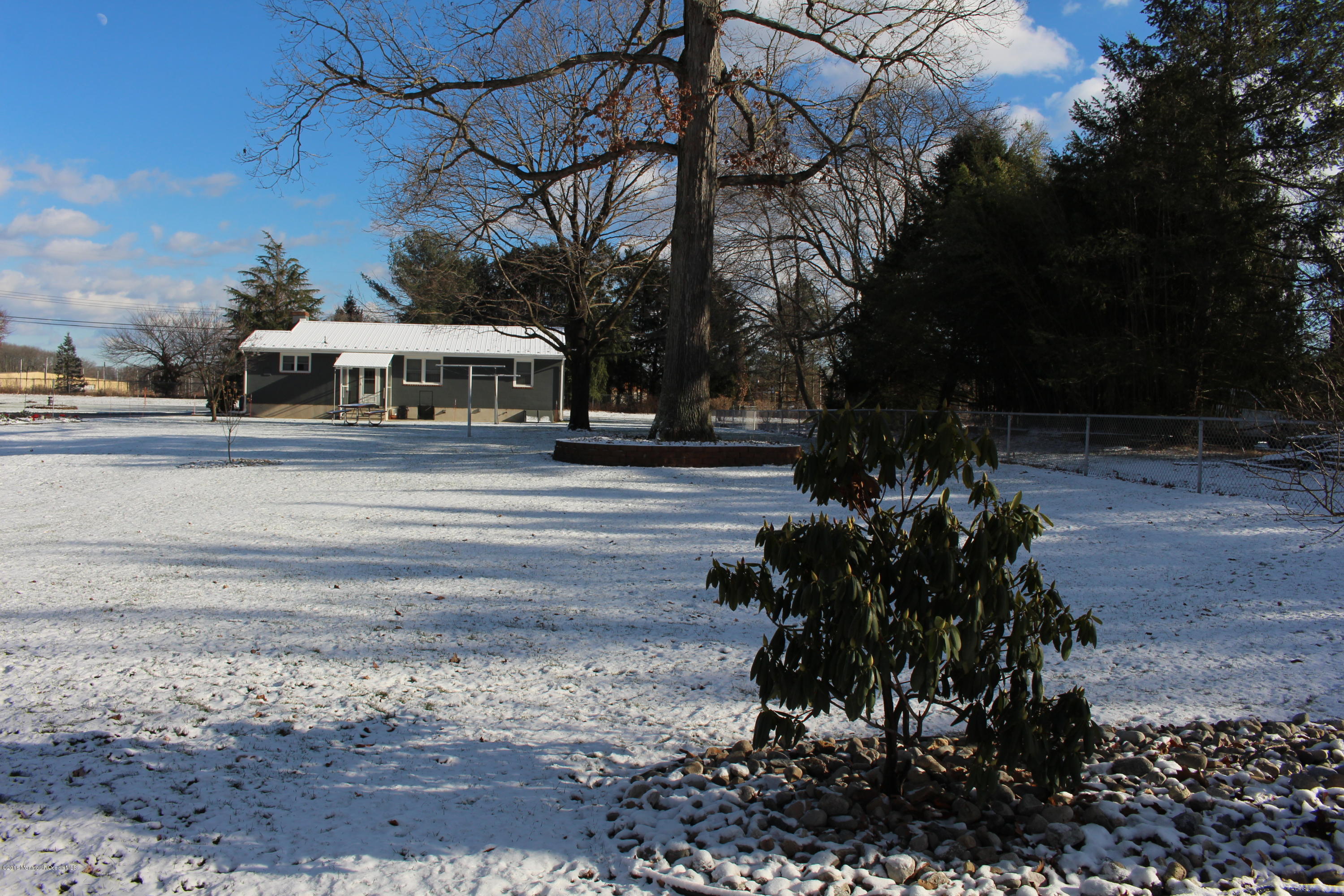 84 Ellisdale Road Allentown, NJ 08501 - Photo 5 of 18 a view of a yard in front of a house