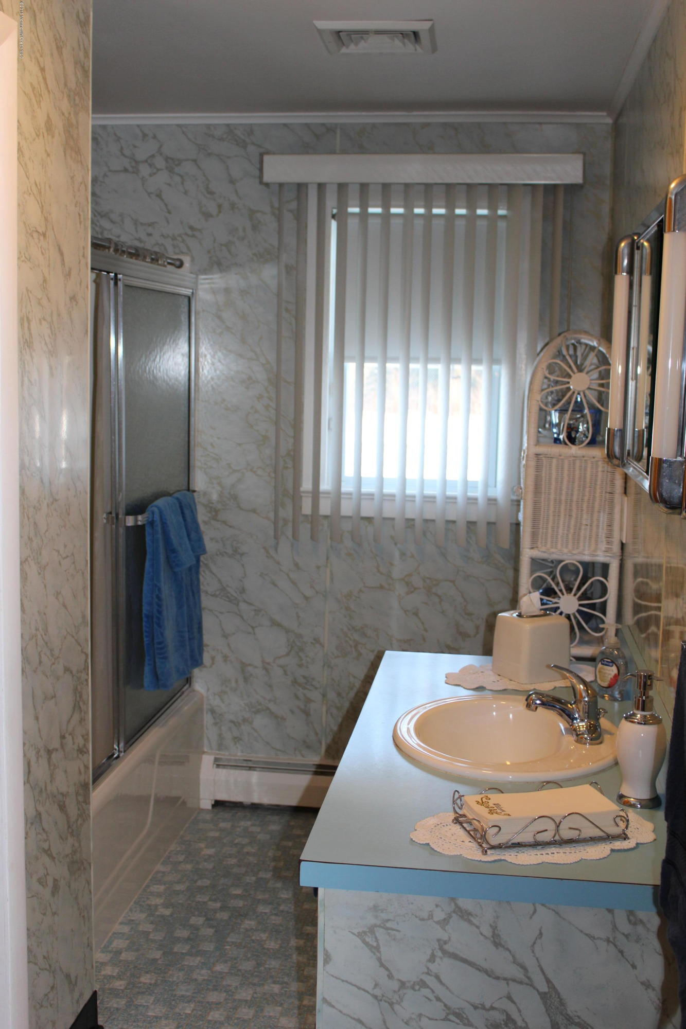 84 Ellisdale Road Allentown, NJ 08501 - Photo 8 of 18 a bathroom with a sink and a mirror