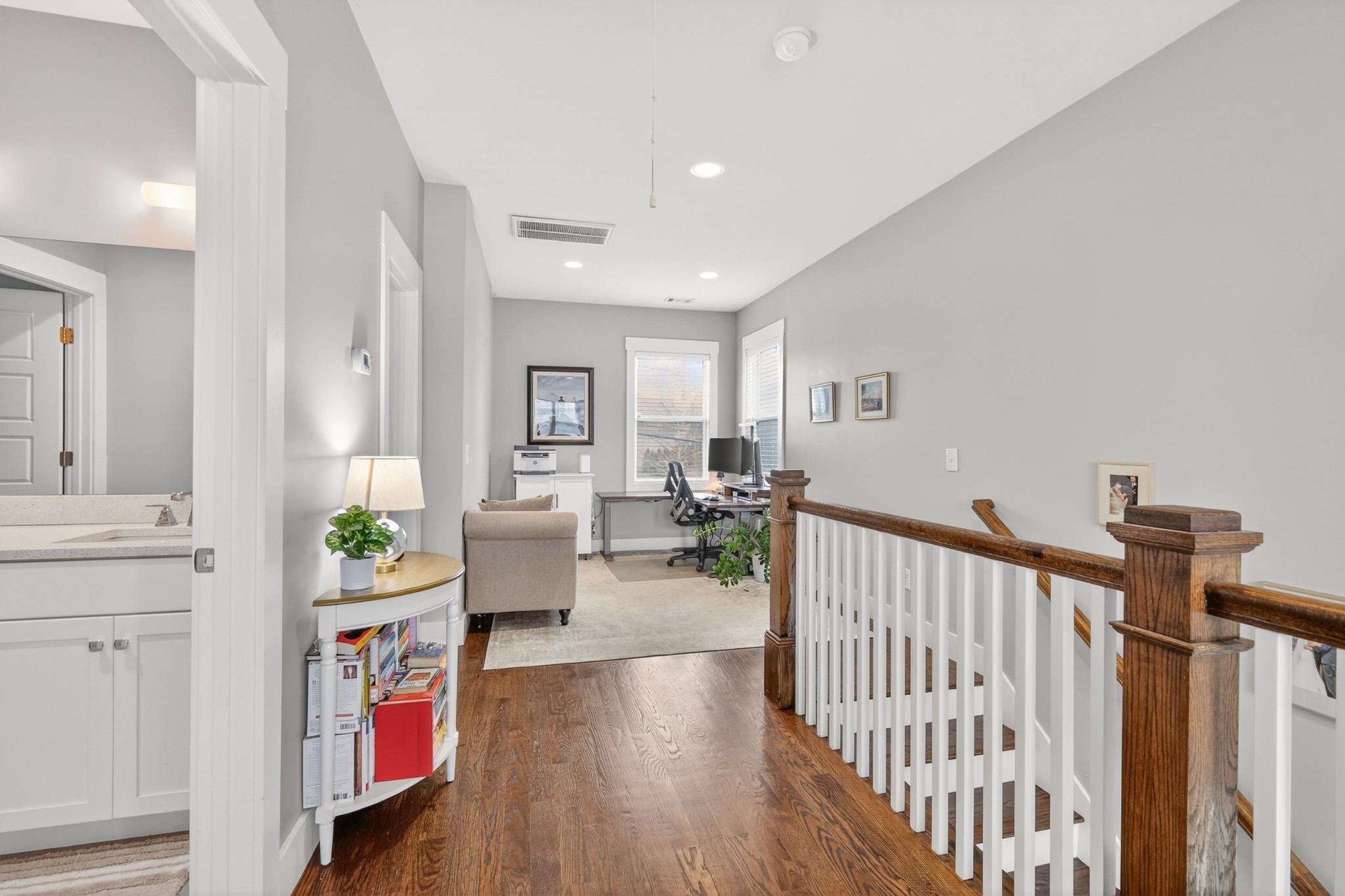 5812 Morrow Road, Unit A Nashville, TN 37209 - Photo 18 of 34 a view of a hallway with dining room and wooden floor
