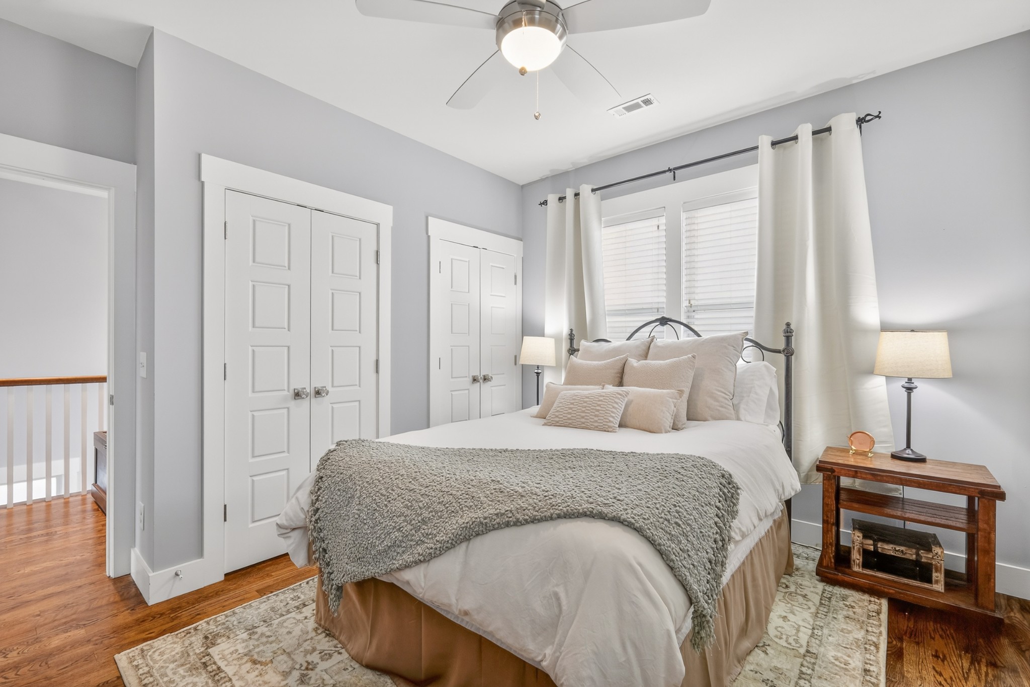 5812 Morrow Road, Unit A Nashville, TN 37209 - Photo 21 of 34 a bedroom with a bed and a chandelier