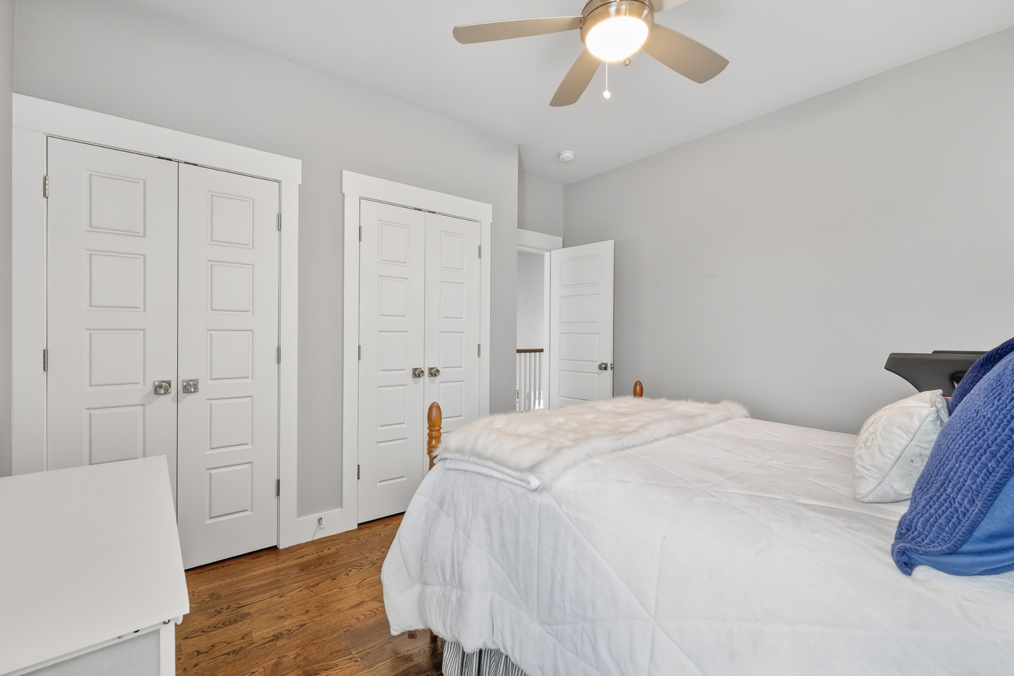 5812 Morrow Road, Unit A Nashville, TN 37209 - Photo 29 of 34 a spacious bedroom with a bed and a chandelier