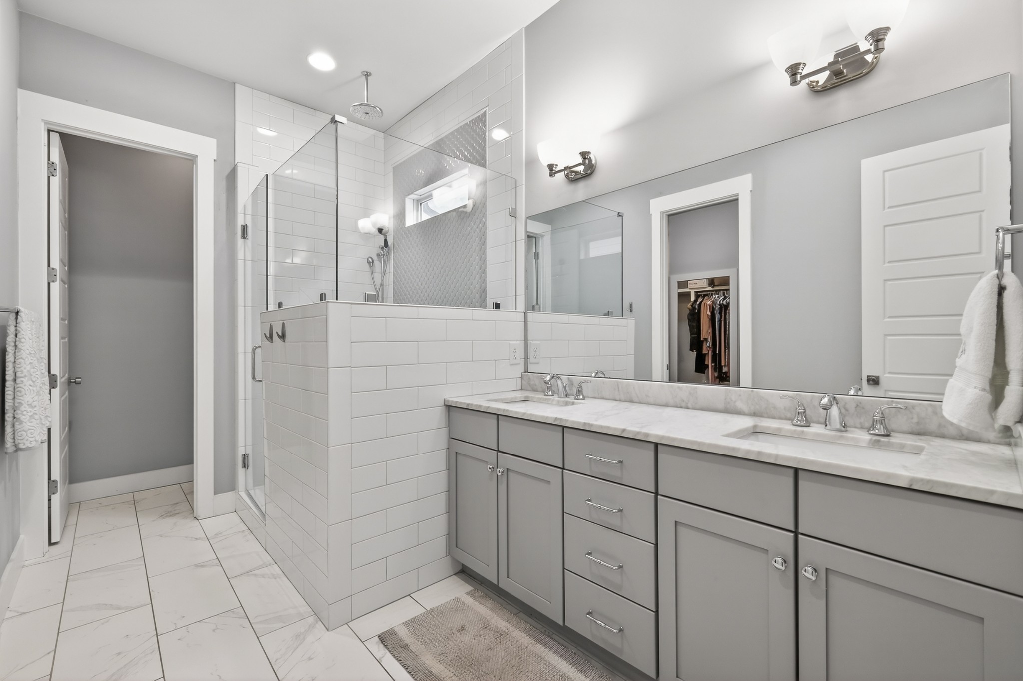 5812 Morrow Road, Unit A Nashville, TN 37209 - Photo 30 of 34 a spacious bathroom with a double vanity sink shower and a mirror