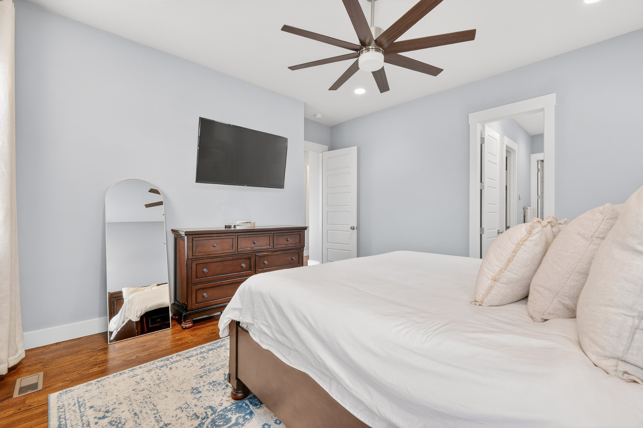 5812 Morrow Road, Unit A Nashville, TN 37209 - Photo 31 of 34 a bedroom with a bed and a flat screen tv