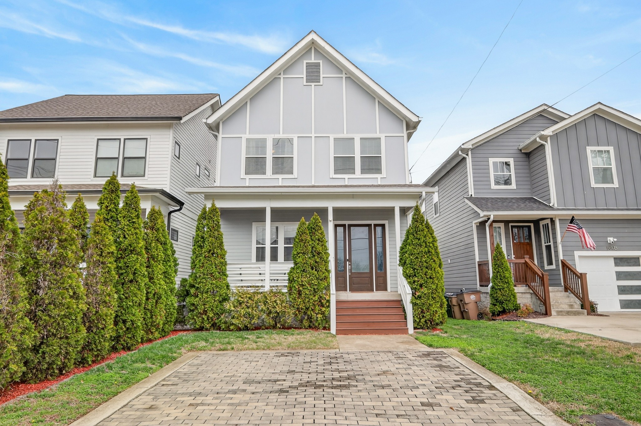 5812 Morrow Road, Unit A Nashville, TN 37209 - Photo 34 of 34 a view of a white house with a small yard and plants