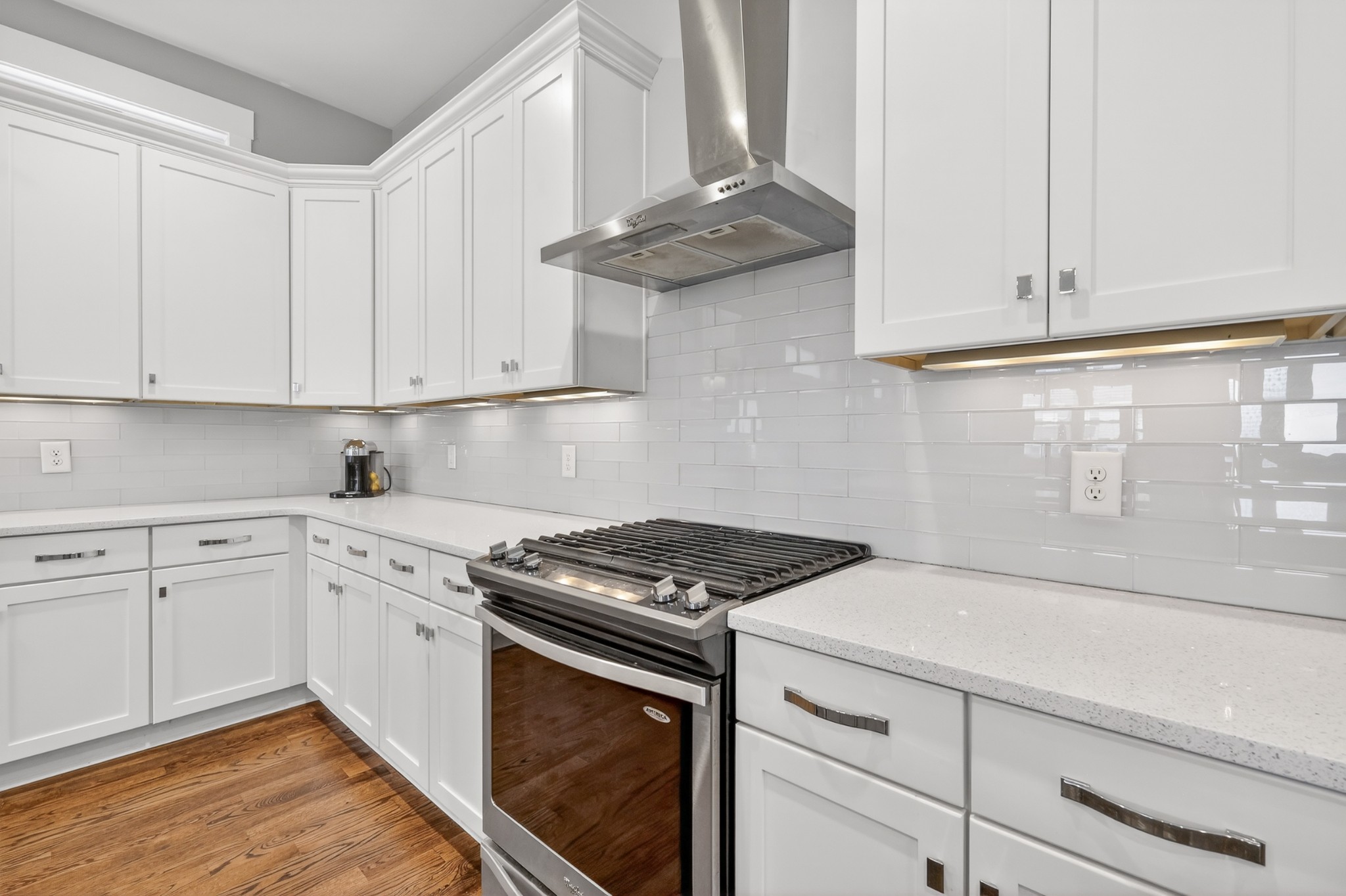 5812 Morrow Road, Unit A Nashville, TN 37209 - Photo 9 of 34 a kitchen with granite countertop stainless steel appliances white cabinets and a stove