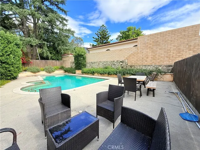 a backyard of a house with seating space