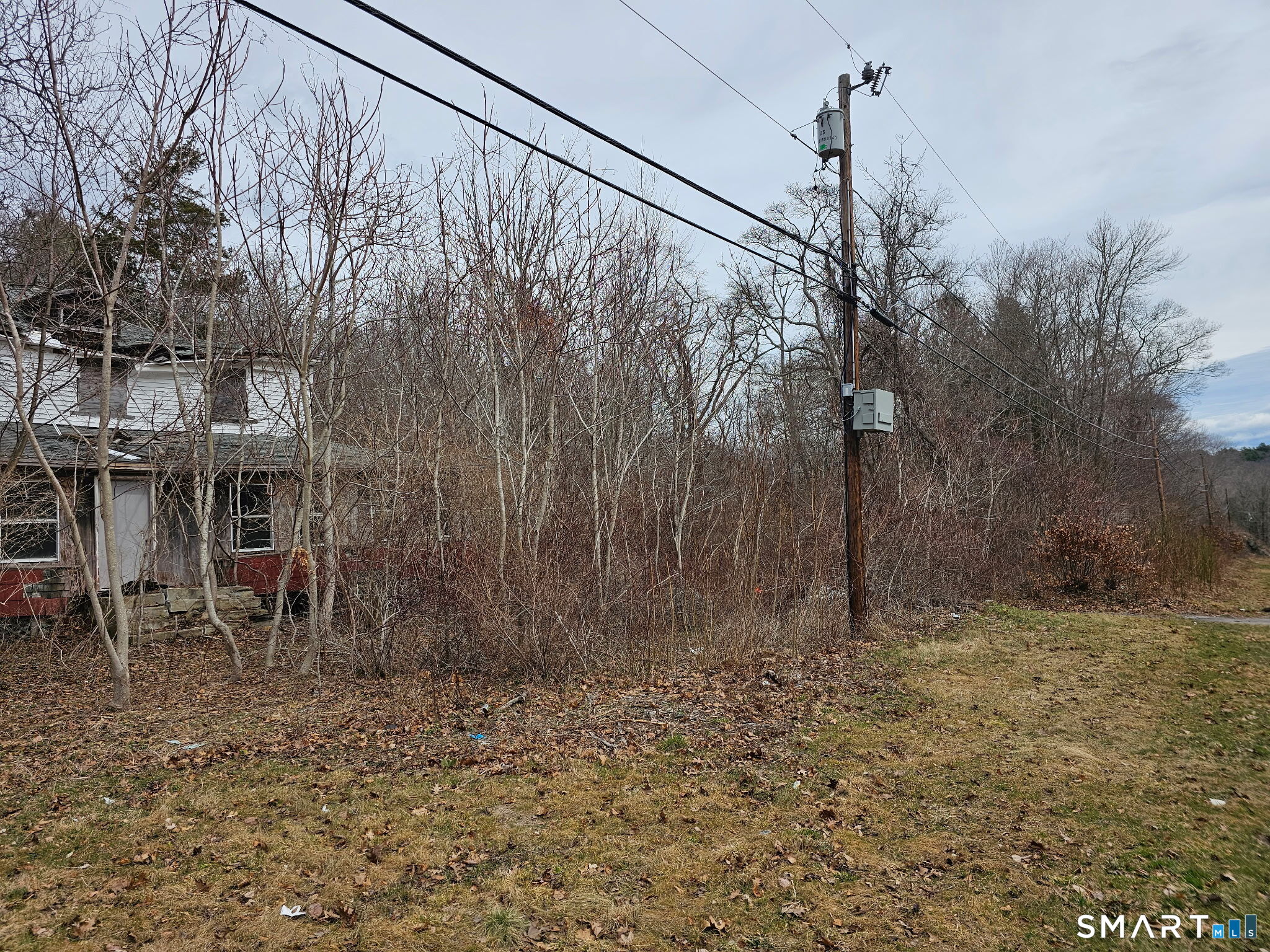 616 Norwich-Westerly Road North Stonington, CT 06359 - Photo 2 of 6 a backyard of a house with lots of green space
