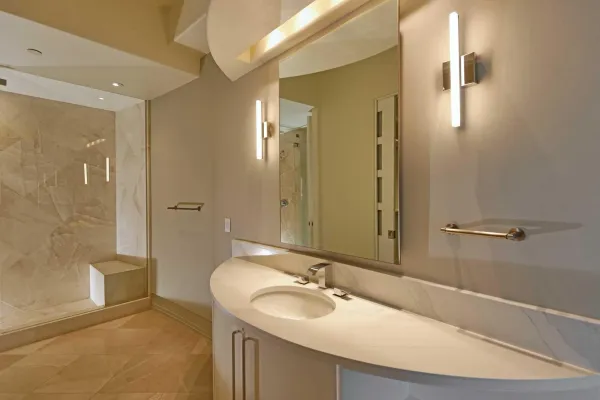 a bathroom with a sink and a mirror