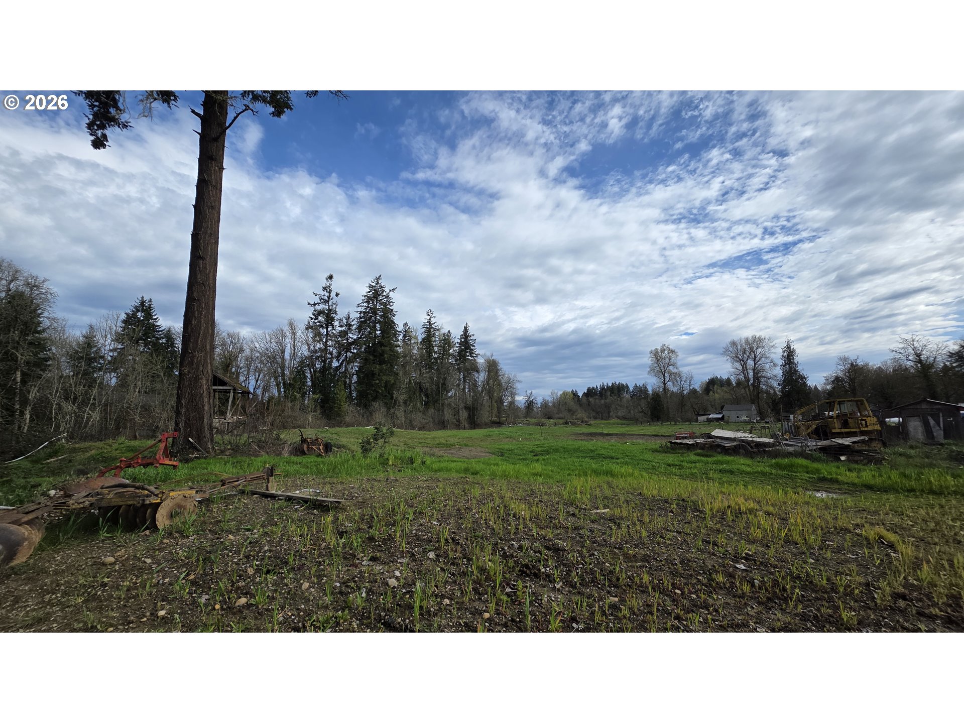 21757 Highway 99E Aurora, OR 97002 - Photo 1 of 11 a open area with trees in background