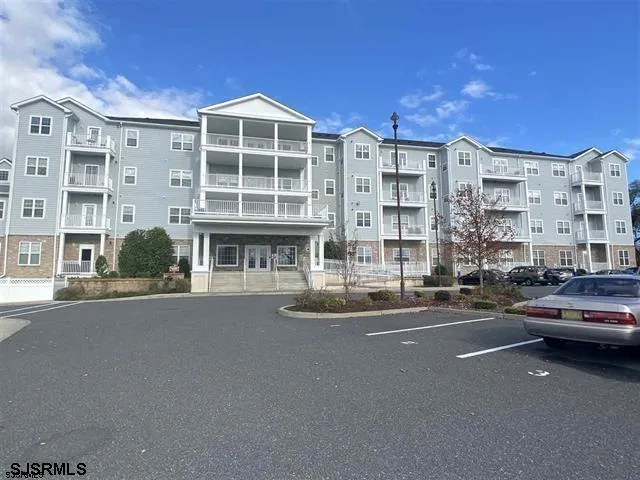 a city street lined with buildings and a street