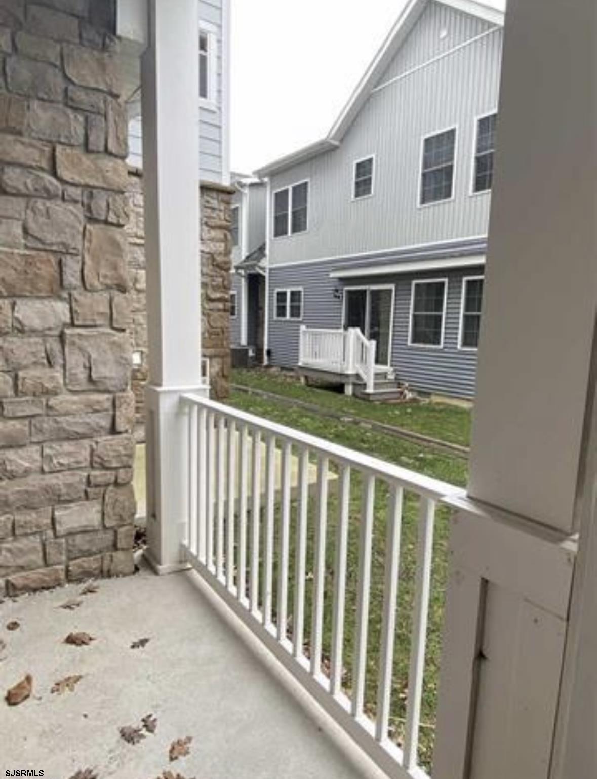1 Mechanic Street, Unit 108 Absecon, NJ 08201 - Photo 19 of 28 a balcony view with a outdoor space