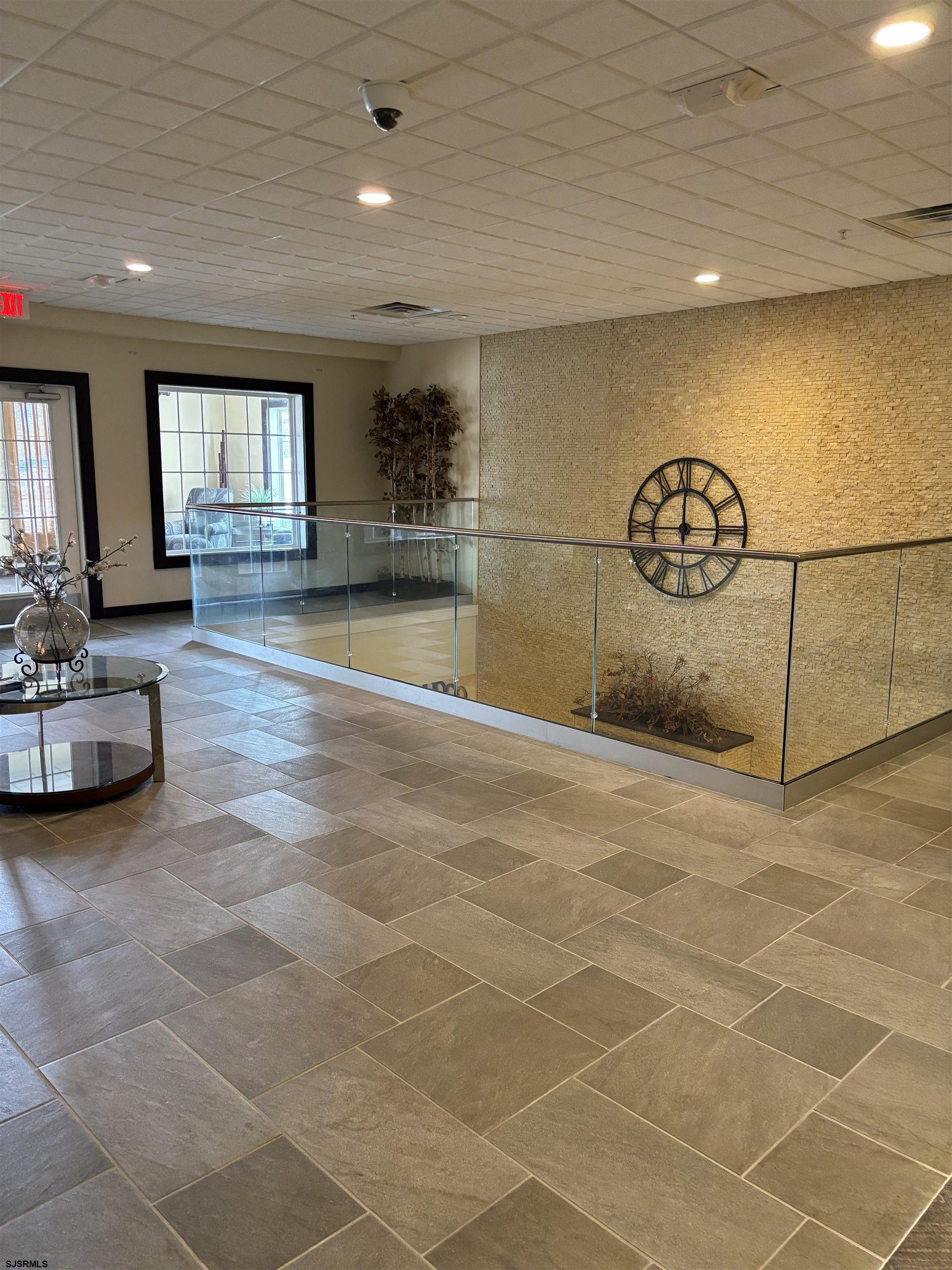 1 Mechanic Street, Unit 108 Absecon, NJ 08201 - Photo 2 of 28 a view of a livingroom with furniture and window