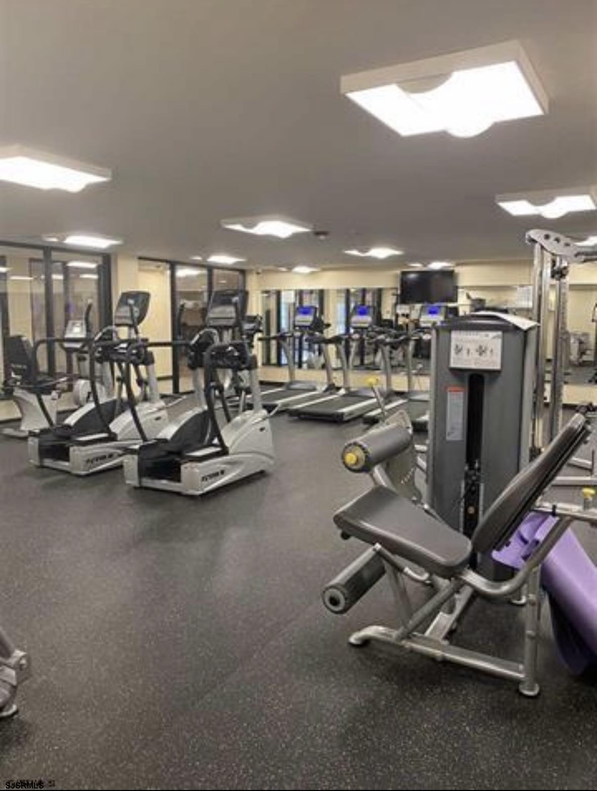 1 Mechanic Street, Unit 108 Absecon, NJ 08201 - Photo 22 of 28 a view of a room with gym equipment