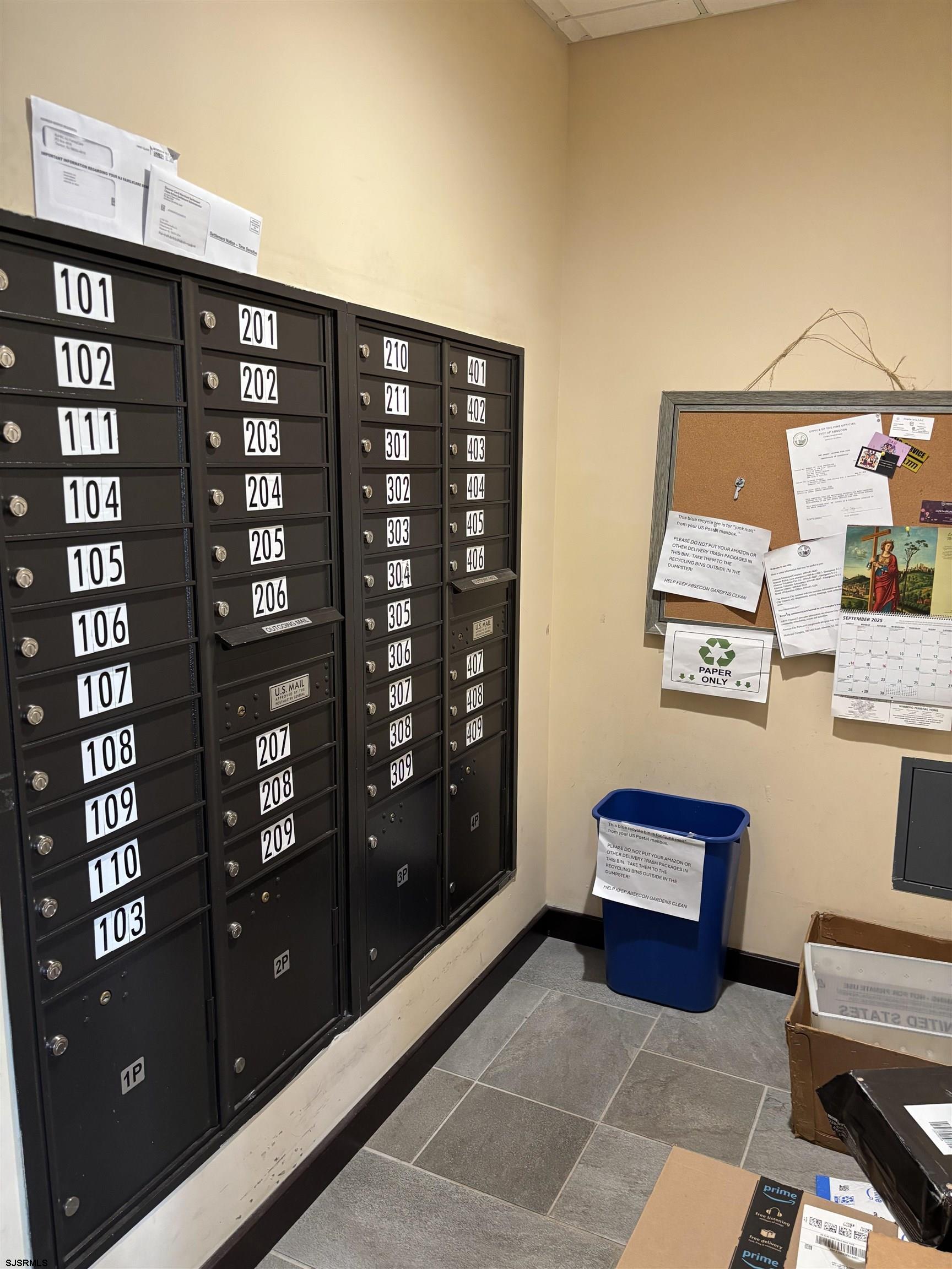 1 Mechanic Street, Unit 108 Absecon, NJ 08201 - Photo 4 of 28 a view of workspace with bookshelf and wooden floor